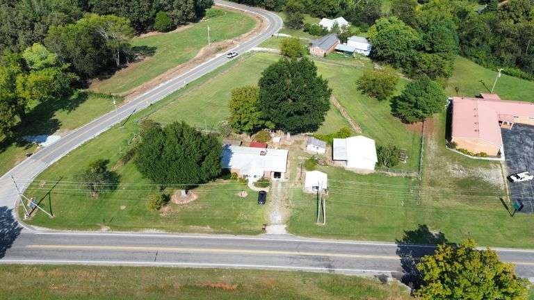 LIVE Auction in Lester, AL - Brick Home, Vacant Lot, Tractor, Tools, and Much More!!