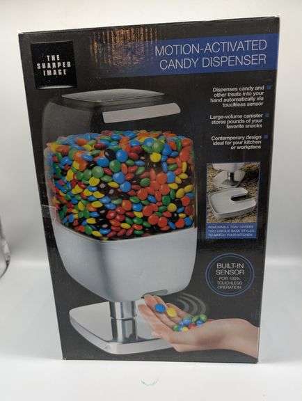 NIB motion-activated candy dispenser
