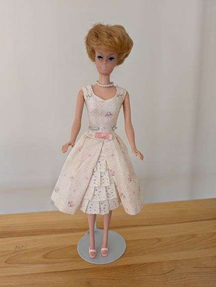 Barbie doll with stand